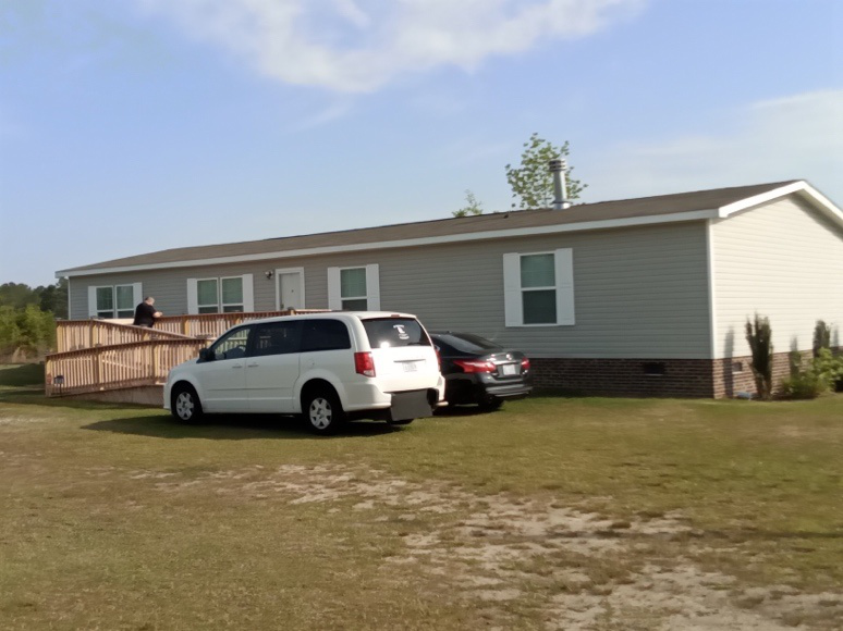 Cars parked outside a house